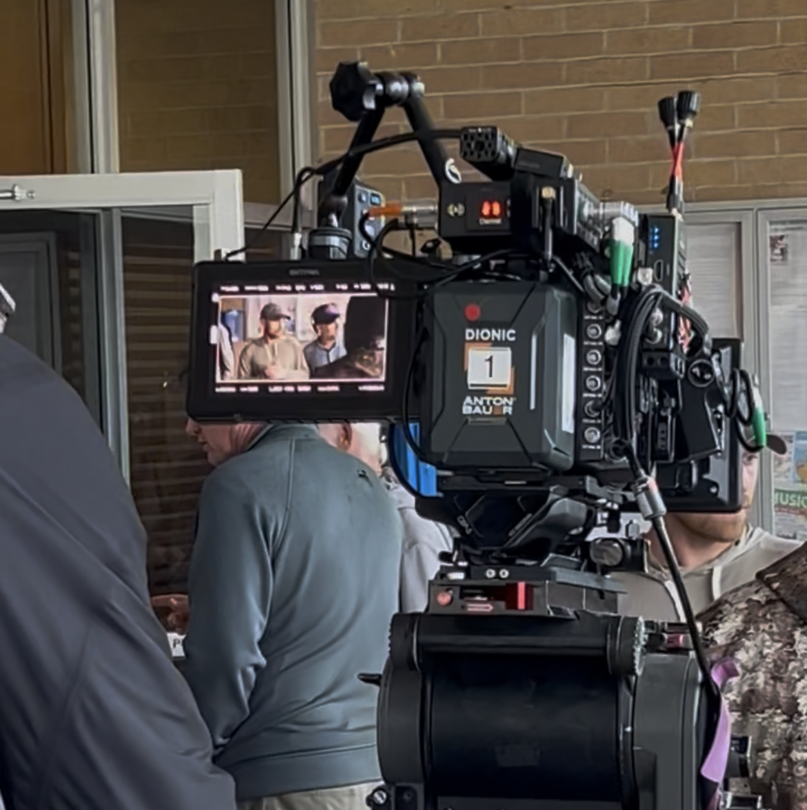Cinema camera with on-set monitor during a film production