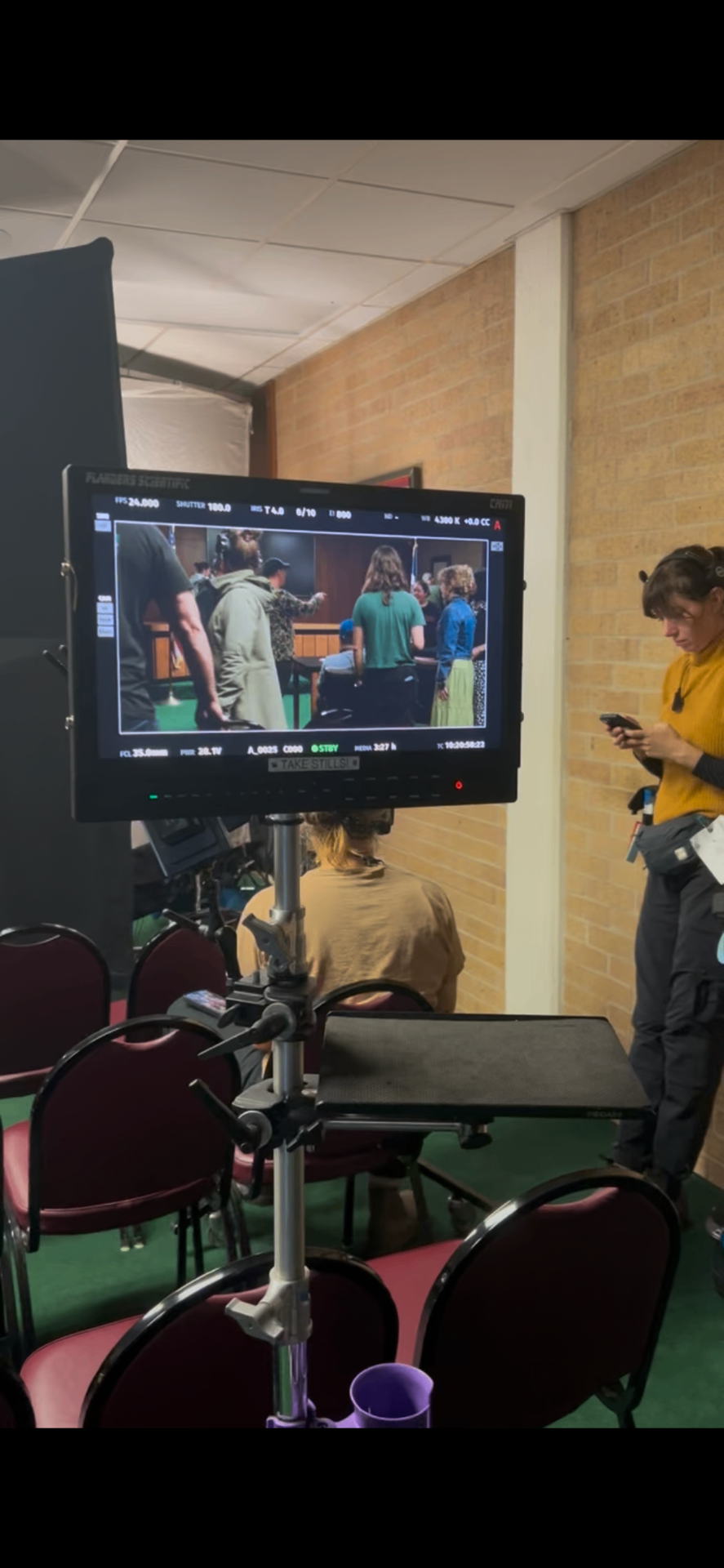 Behind-the-scenes monitor on set